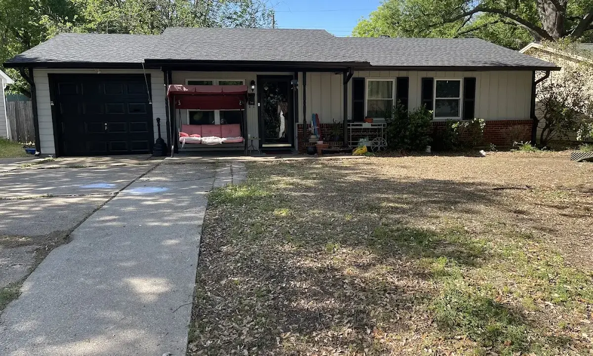 Asphalt Shingle Roof Repair crew at work on a residential roof in Stuart